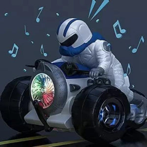 A man in a space suit rides a toy car, featuring a Stunt Spin Motorcycle that rotates 360 degrees and plays music.