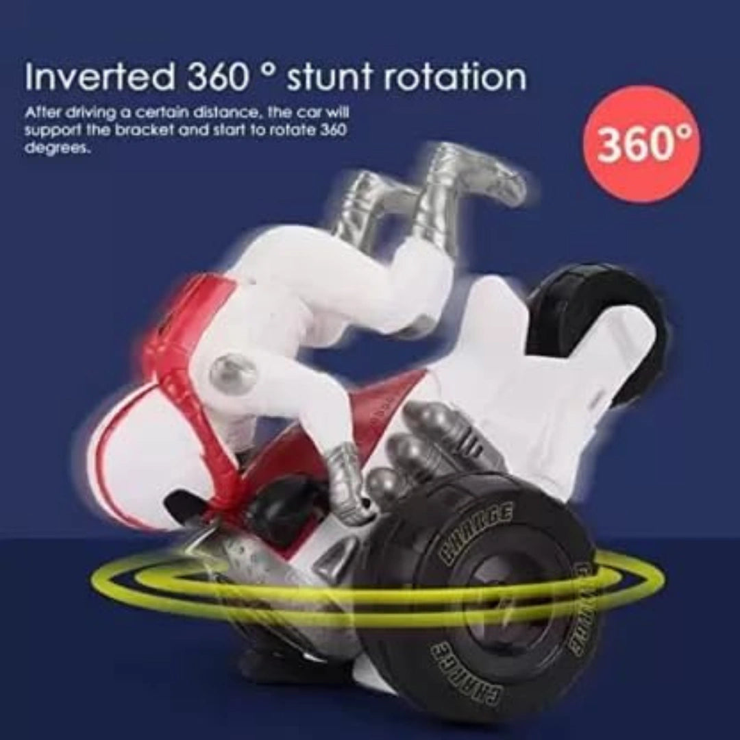 A toy Motorcycle and a man engaged in an impressive inverted 360-degree stunt rotation.